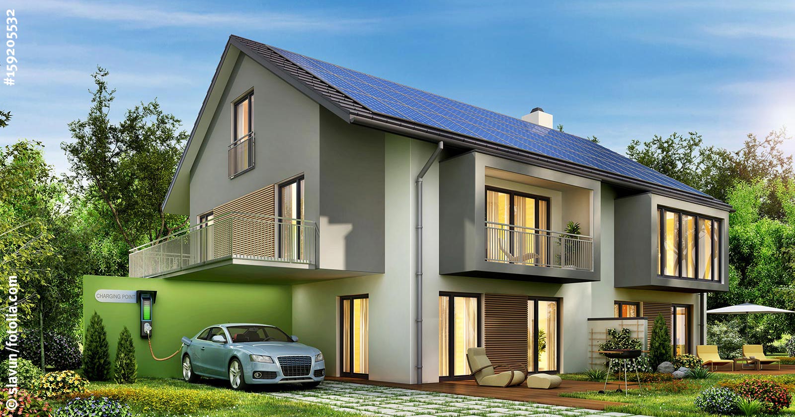Haus mit Photovoltaik auf dem Dach, Wallbox und E-Auto