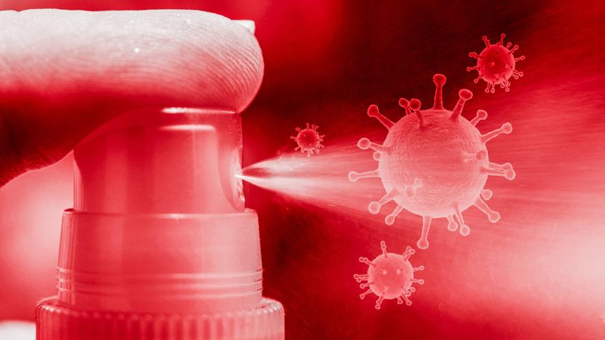 Finger auf Spray, Sprühstrahl gegen stilisierte Coronaviren